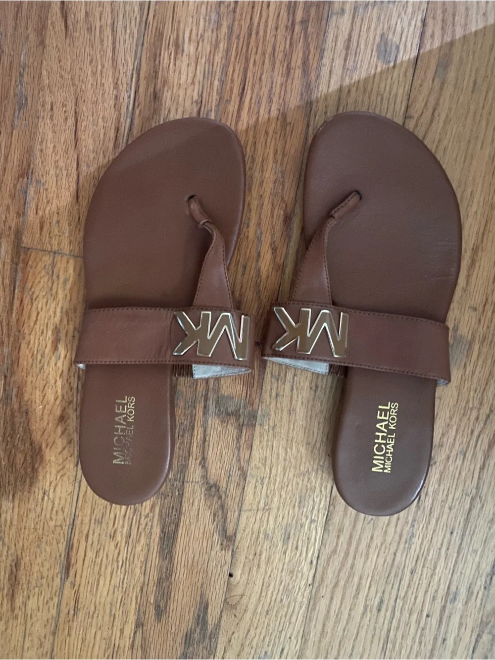 Women’s mK thong sandals 7 tan leather Upper; gold MK emblem